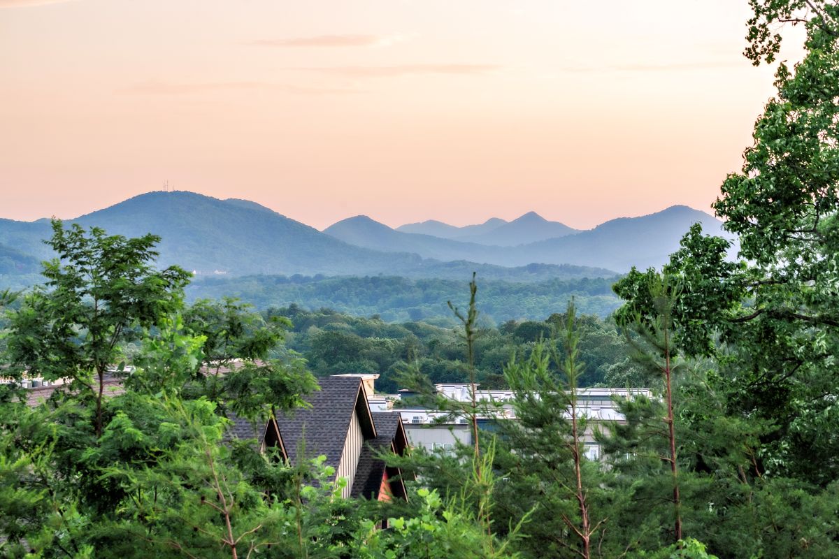 Reynolds Mountain Villas rooftops at sunset — move-in ready now
