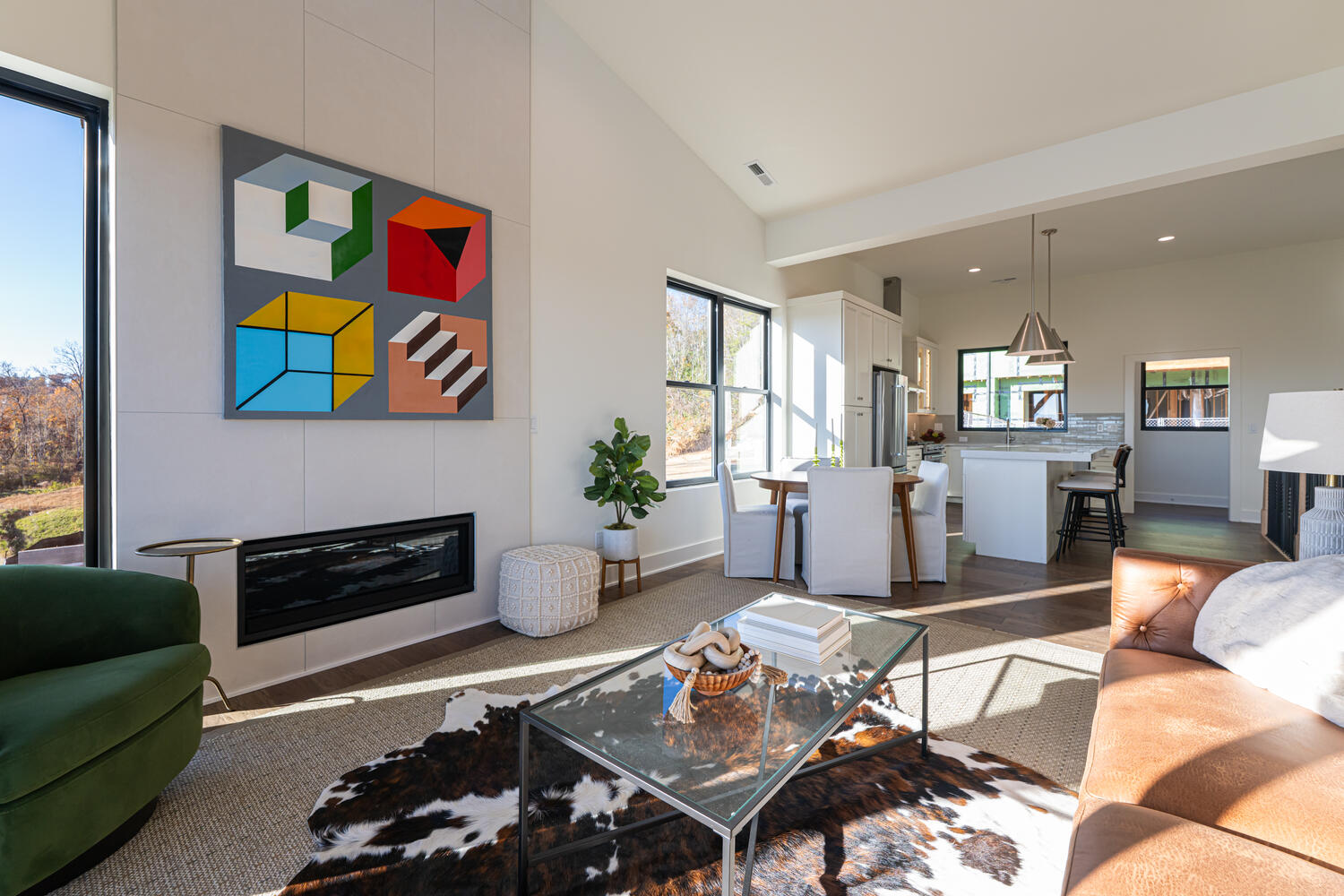 Summit Collection living room with fireplace and mountain views