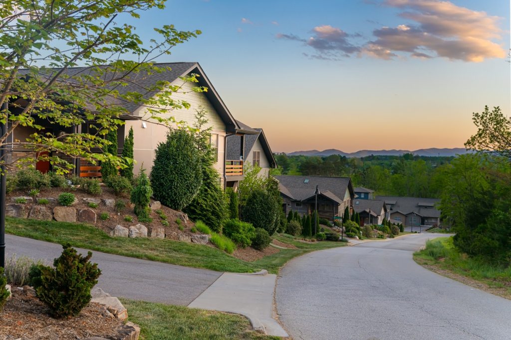 Senator Reynolds Road on Reynolds Mountain - The Terraces on the left, Reynolds Mountain Villas across the street, a half-mile walk to Reynolds Village