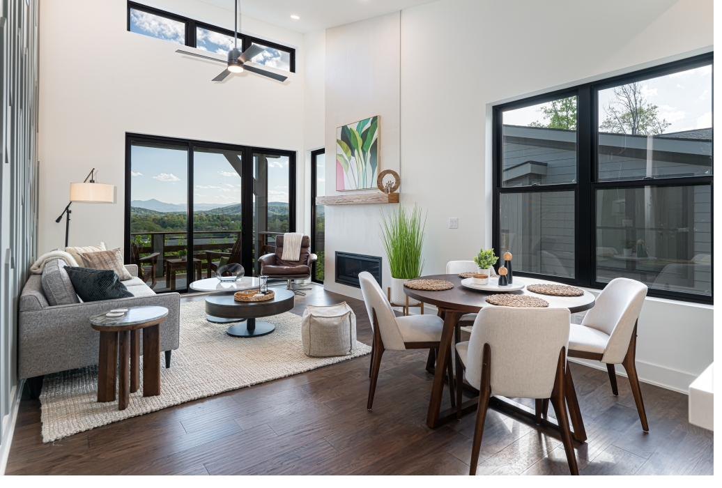 Summit Collection vaulted great room with mountain views