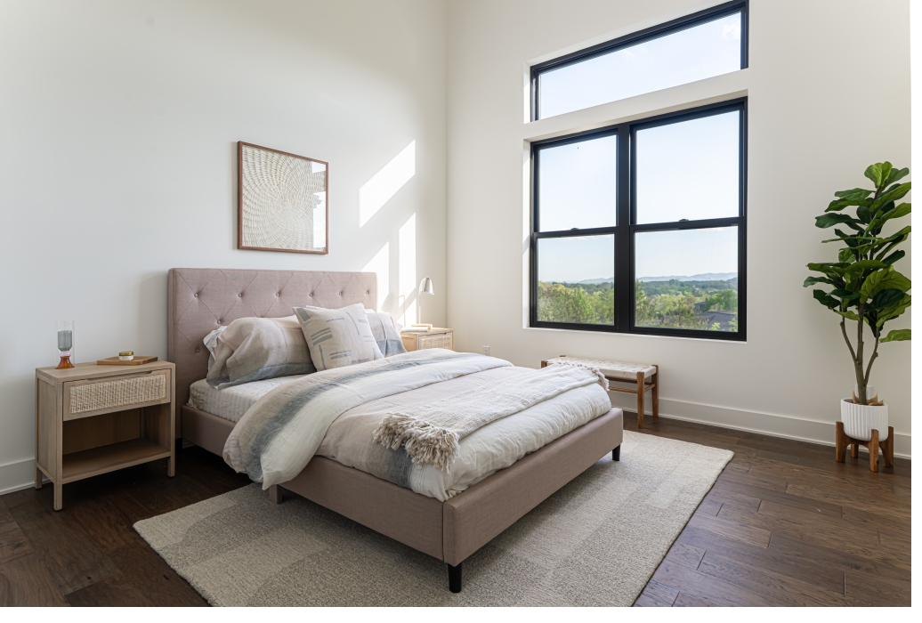 Primary bedroom with mountain view windows