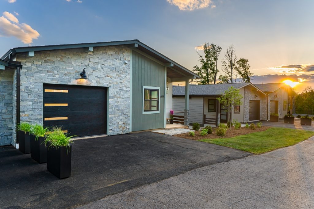 A finished Reynolds Mountain Villa at sunset — built to custom-home standards, move-in ready