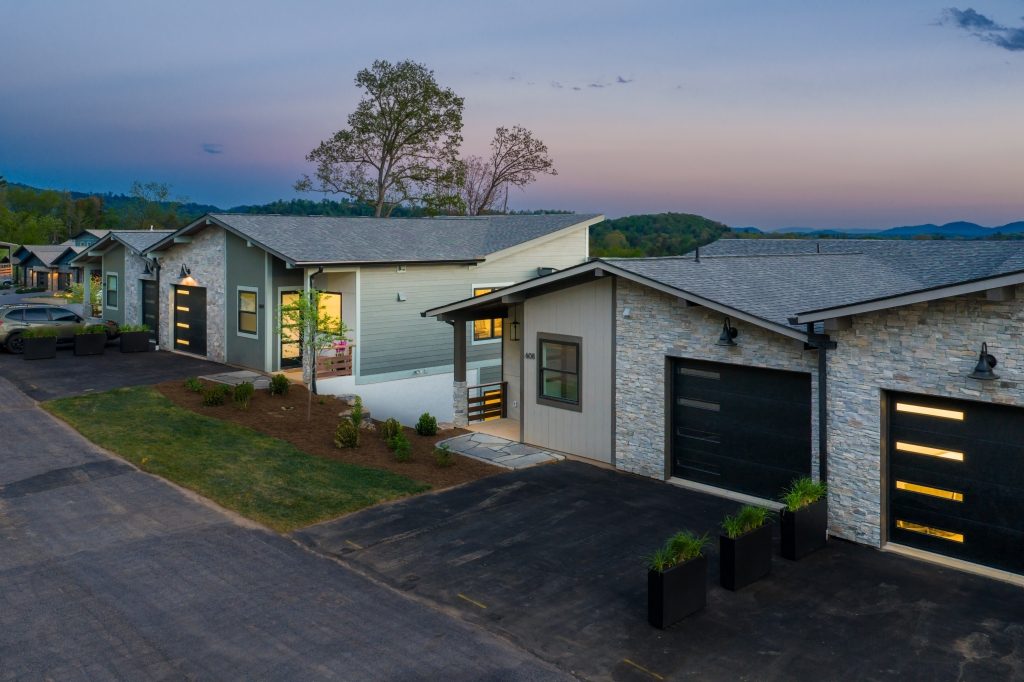 Reynolds Mountain Villas at twilight — paired luxury villas on the mountain in North Asheville